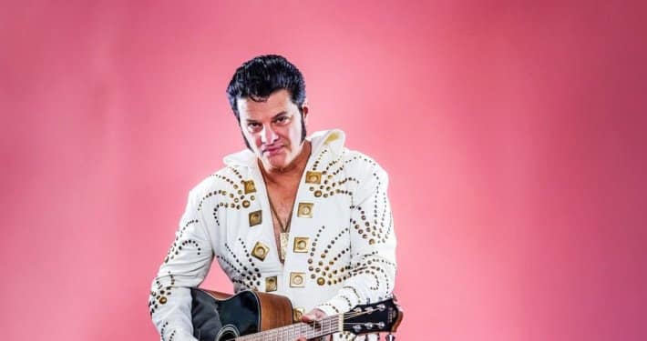 Rocking Elvis, Melbourne Elvis tribute artist Serafino Alberti, with guitar