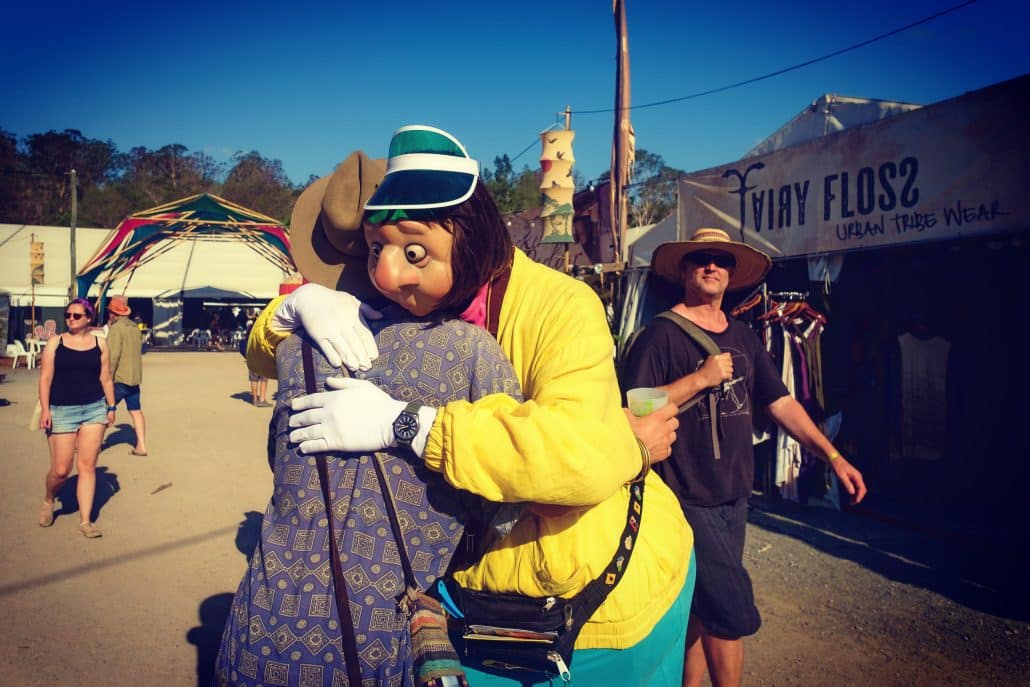 The Mask Family roving tourist characters greeting festival guests